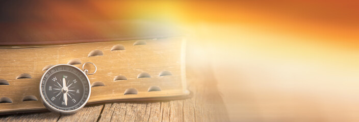 Holy Bible with compass © Daniel