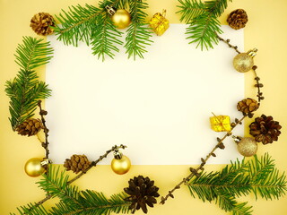 New Year composition on  white  background. Christmas frame with fir branches and cones.  Top view, copy space, flat lay.	