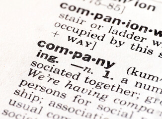Closeup of the definition of the word company