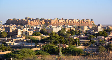 Fototapeta na wymiar Jaisalmer Fort or Sonar Quila or Golden Fort made of sandstone. UNESCO world heritage site at Thar desert along old silk trade route.
