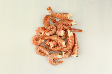 frosted king prawns closeup photo on white table background © ulianna19970