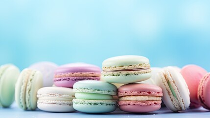 Fototapeta na wymiar a pile of macaroons sitting next to each other on top of a white counter top next to a blue wall. generative ai