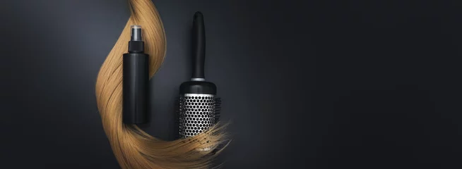 Foto op Aluminium Blond shiny hair wave, Round brush for styling hair and Hair care spray, on black background. Hairdresser service, hair strength, haircut, hairstyle. Concept hairdresser spa salon. © Alexa Mat