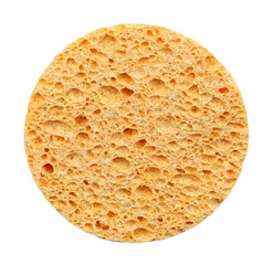 Round yellow porous sponge for facial skin care on a white background. Skin care. Cosmetic disc sponge. View from above