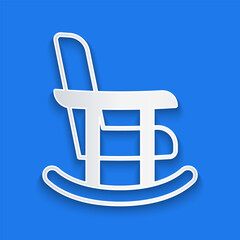 Paper cut Rocking chair icon isolated on blue background. Paper art style. Vector