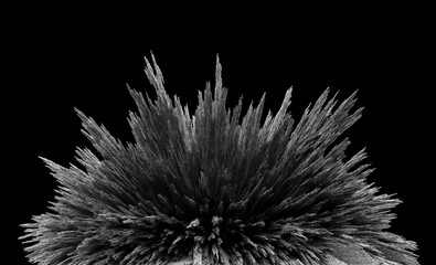 Iron dust spikes. Reaction of iron powder to a magnetic field. Iron filings. Isolated on black...
