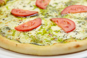 tasty pizza on the wooden background