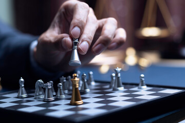 Businessman playing chess think problem solving. business competition planning...