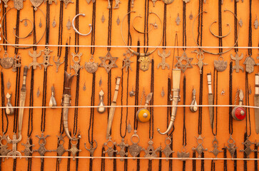 Traditional moroccan souvenirs - dagger and amulets in street trade in Ait Ben Haddou, Morocco