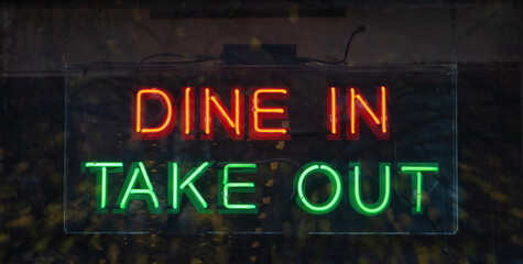 dine in take out neon sign on fast food take away restaurant