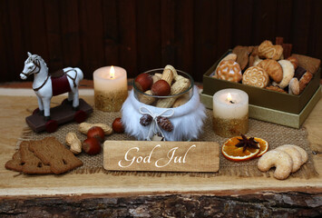 Christmas greeting card: candles with sweets, Christmas decorations,
  Pastries and the Swedish...