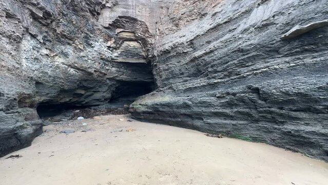 Looking inwards to the famous tourist landmark known as 'Boggle Hole' cave. Situated in Fylingthorpe, near Whitby, North Yorkshire, England