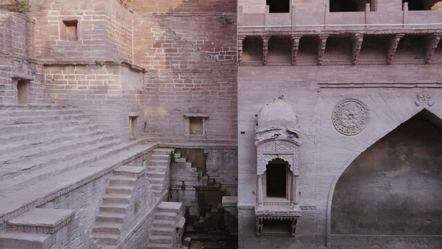 ancient red stone unique stepwell architecture at day from different angle angle