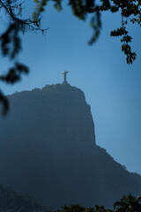 Distant View of Christ the Redeemer and Mountain Silhouette under Blue Sky