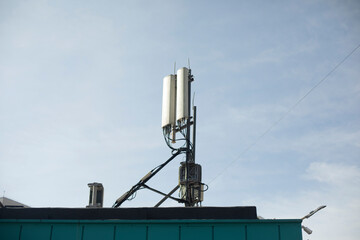 Rooftop antennas. Radio communication on building. Signal transmission.