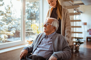 Compassionate Caregiver with Elderly Man at Home