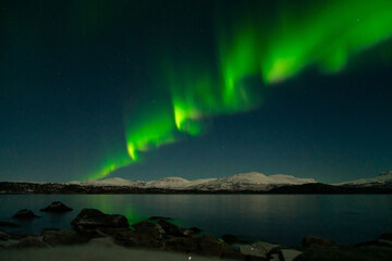 Green aurora in Kiruna, Sweden - obrazy, fototapety, plakaty