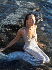 Pretty girl in diamond dress