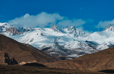 Beautiful landscape with snowy mountains in autumn