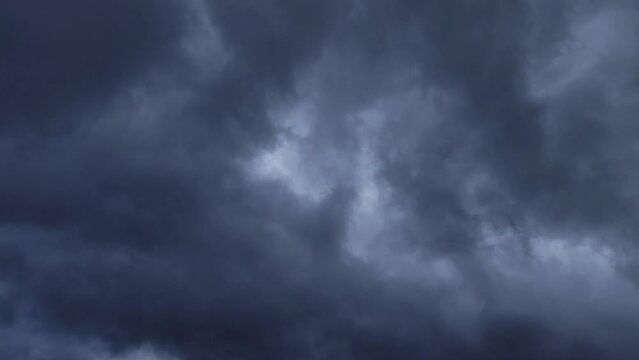 Landscape of birds flying in a beautiful stormy sky