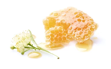 Fotobehang Linden flowers with honeycomb on white background © Dionisvera