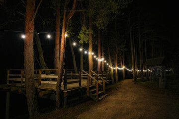 The nature trail of the city of Strenci along the river Gauja is illuminated with lamps