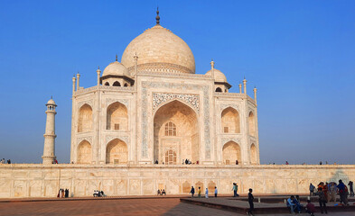  Taj Mahal at sunrise is an ivory-white marble mausoleum on the right bank of the river Yamuna in...