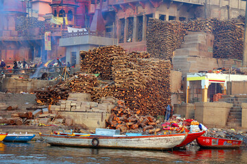 View of the ceremony of the cremation of a unknown Hindu person at Manikarnika Ghat front the Ganges river in Varanasi India