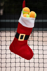 Christmas Stocking with Beach Tennis Balls on Sports Net