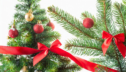 close up christmas tree with red ribbon on white