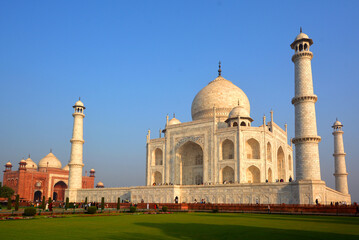 View of the Taj Mahal at sunrise is an ivory-white marble mausoleum on the right bank of the river...