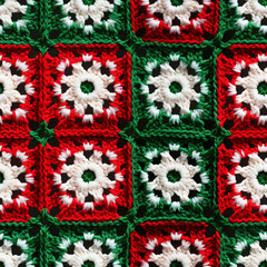 Seamless granny square crochet motifs of Christmas snowflakes background. Xmas colors.