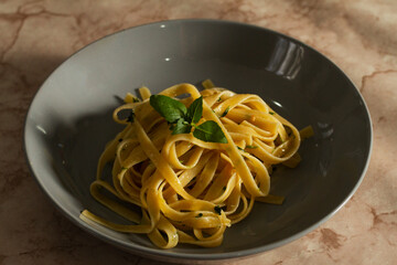 Fetuccini pasta with basil