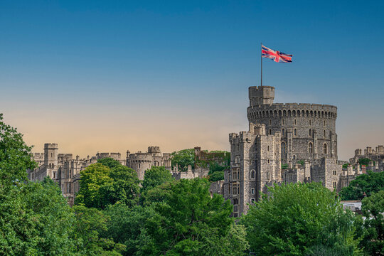 Windsor Castle Round Tower with the British Union Flag blowing in the wind HDR High Dynamic Range, England
