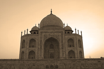Taj Mahal at sunrise is an ivory-white marble mausoleum on the right bank of the river Yamuna in Agra India