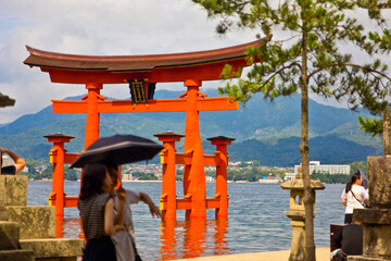 ancient torii in the island of miyajima in japan
