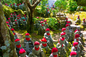 little buddha statues in a temple in the island of Myiajima in japan
