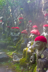 little buddha statues in a temple in the island of Myiajima in japan
