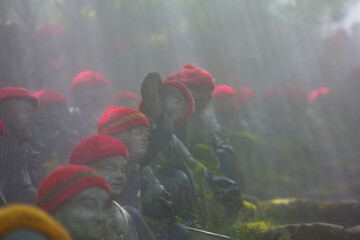 little buddha statues in a temple in the island of Myiajima in japan