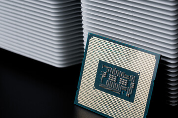 odern personal computer processor – CPU, white metal radiator for cooling it. Heat dissipation, thermal conductivity and processor cooling. Socket LGA 1700. High-end cooling system. Photo.