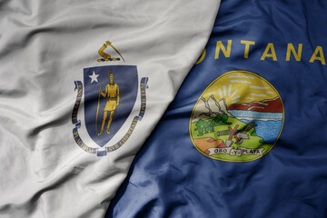 big waving colorful national flag of montana state and flag of massachusetts state .