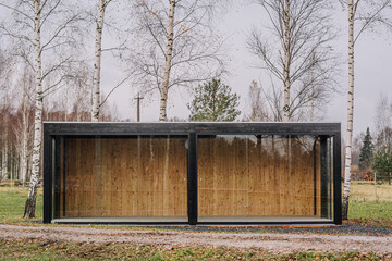 Small wooden house in the countryside during autumn season