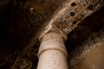 ancient column holding up ceiling in Karnak Temple in Luxor Egypt
