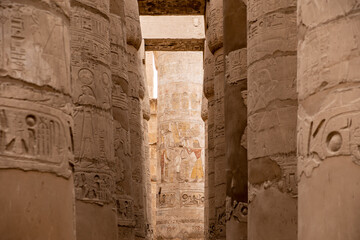 ancient Egyptian hieroglyphs on massive columns of hippostyle hall in karnak temple in luxor, egypt