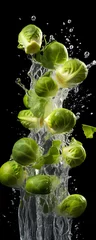 Deurstickers This tall photo captures the graceful freefall of brussel sprouts and water, their succulent forms suspended in midair, on a black background showcasing the dynamic beauty of nature's bounty © Russell
