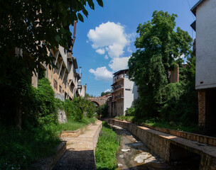 The old houses and stone bridges across the river that flows through Kratovo. It is located in the...