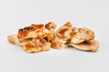 Fast cooking.Chicken fillets fried until half cooked, semi-finished product on a white background. Fast homemade food.Fast food. Quick cooking at home. Copy space.