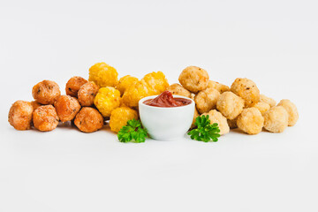 Assorted Breaded Chicken Inner Fillet,Chicken Breaded Raw Meat.Fast cooking.Breaded Chicken nuggets Fillet with salad on a White Background,food at home.Fast homemade food.Chicken breaded .