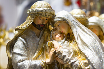 Nativity figures of The Holy Child, The Blessed Virgin Mary and Saint Joseph