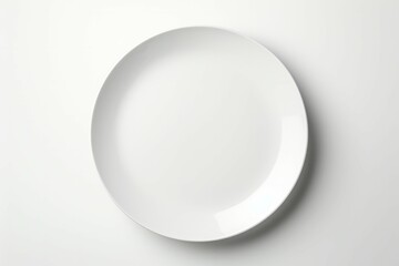 White plate placed on a white background - obrazy, fototapety, plakaty